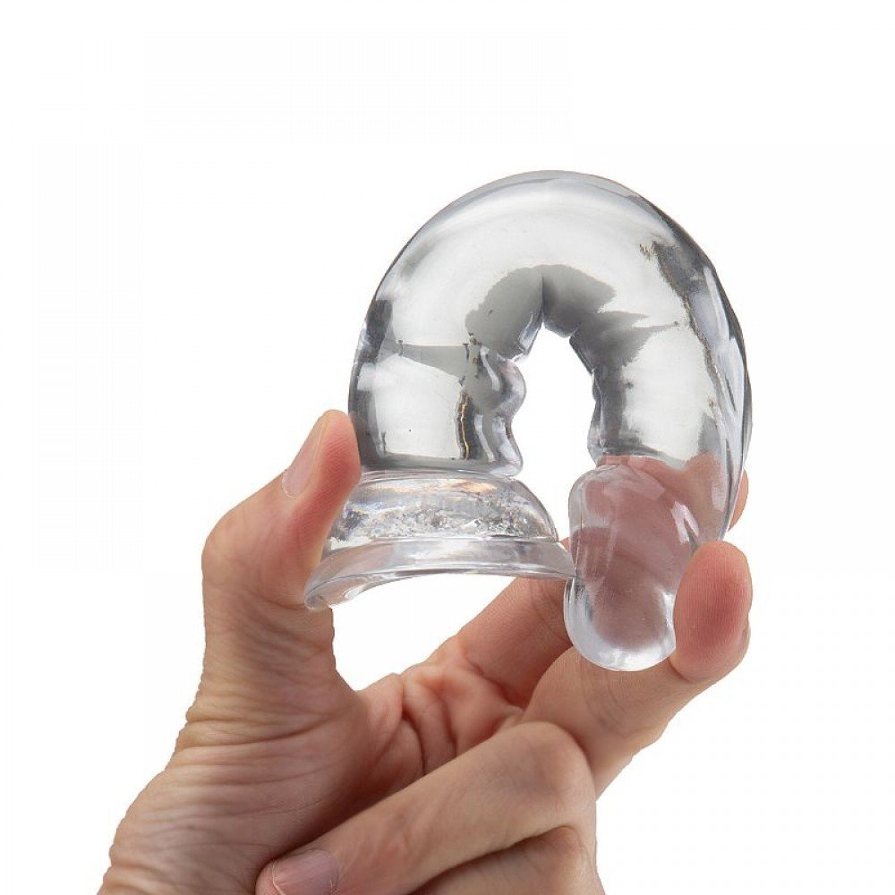 Dildo realístico transparente - 14,8cm x 3,0cm O Dildo realístico transparente é uma prótese em forma de pênis, confeccionada em silicone com glande definida e textura de veias, ideal para penetrações em ângulo reto. Dildo realístico transparente - 14,8cm x 3,0cm
